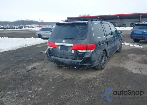 2009 Honda Odyssey Touring z USA, uszkodzony, nr VIN 5FNRL38849B005291